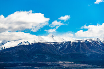 landscape with lake and blue sky and clouds