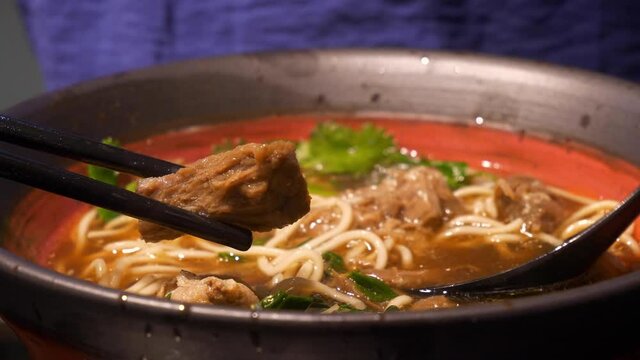chinese famous street food soup with chopsticks close up slow motion panorama 4k china