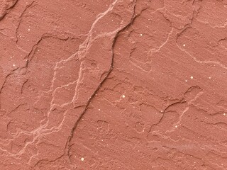 Abstract surface texture on red rock,  forming interesting background for compositing and graphics