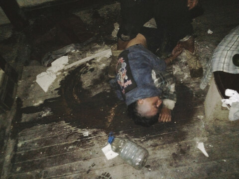 Man Passed Out in Vomit