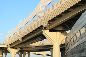 large car overpass with large supports in the evening in autumn