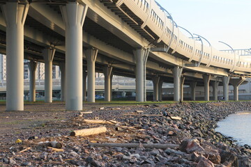 large car overpass with large supports in the evening in autumn