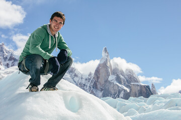 Young man on a glacier in Patagonia - Cerro Torre, Chalten, Argentina