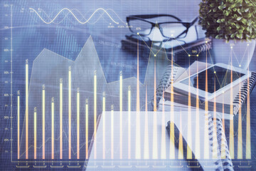 Double exposure of forex chart drawing and cell phone background. Concept of financial trading