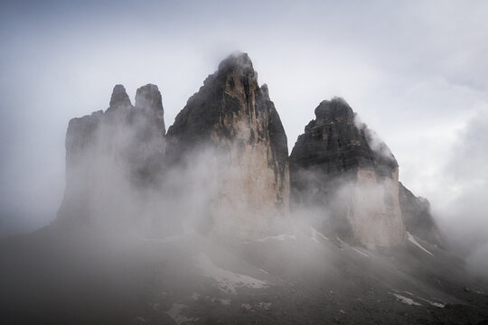 Mountain Tops of the Tre Cime di Lavaredo shredded in Clouds