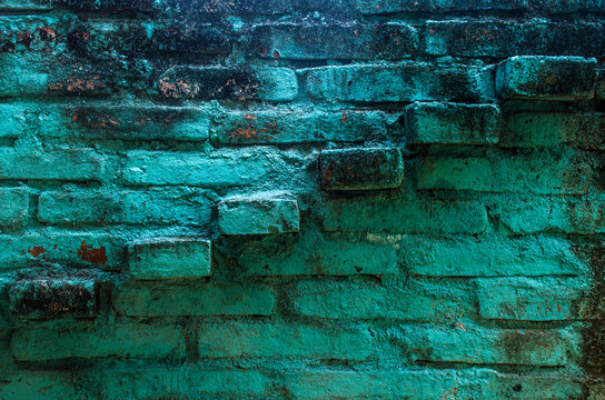 Old, abandoned, colorful and aged bright blue wall texture