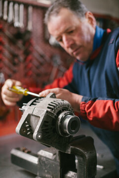 Mechanic working in auto repair shop