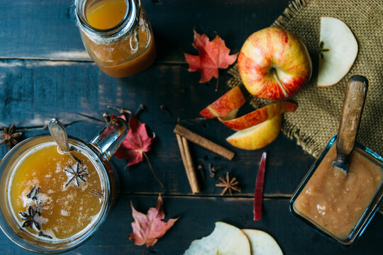 Fresh apple sauce and cider with spices from above