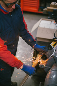 Man sharpen an ax