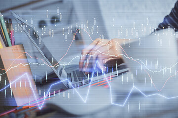 Plakat Double exposure of woman hands typing on computer and forex chart hologram drawing. Stock market invest concept.