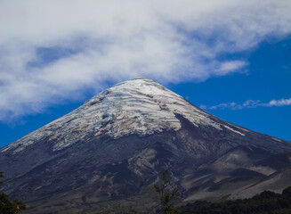 Peak of Osorno Volcano with snow, ice and crevasses