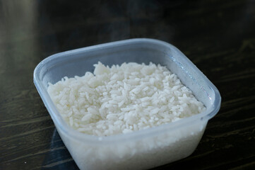 close up in plastic pot with white rice