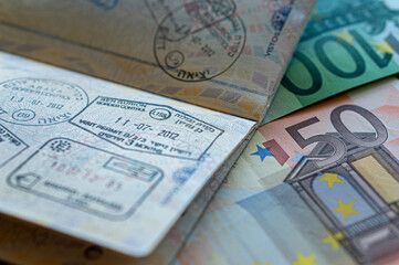 close up on euro passport and banknote details