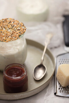 Marzipan-mascarpone mousse, spicy plum pulp, parmezan tuile in glass