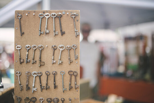 Old keys on a cork board