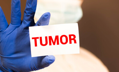 Tumor, word cube with background
