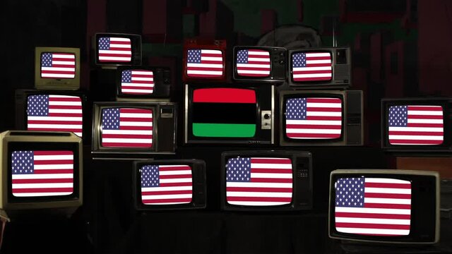 Pan African Flag among Many US Flags on a Vintage TV Stack Installation.