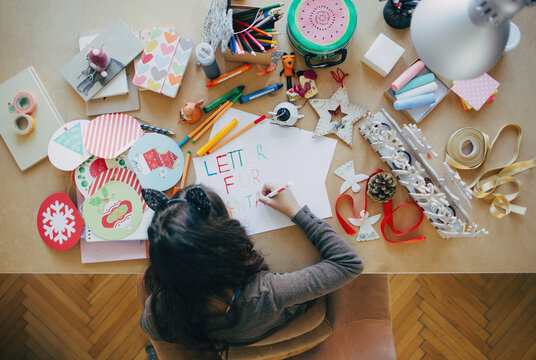 Girl Writing a Letter to Santa