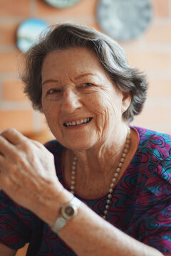 Portrait of a happy 84 year old woman