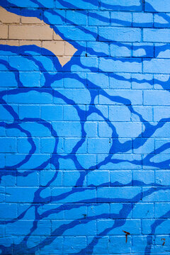 graffiti painted brick wall