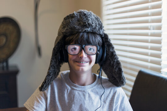 Silly young boy wearing crazy eyeglasses