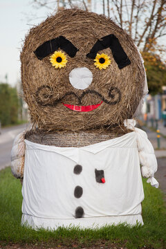 Man made out of straw bales