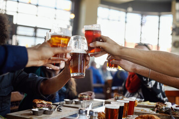 Group of friends gathering having drinks alcohol beer