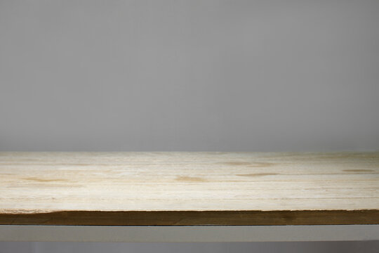 Close up of used wooden and metalic table