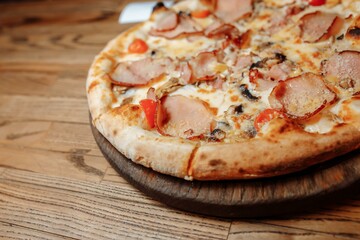 Pizza on wooden table top view. Fast food. Post blog social media. with copy space. Pizza ready to eat