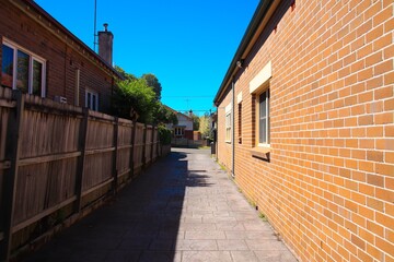 A Car driveway in a Suburban Sydney House with a neighbours house in view in the distance