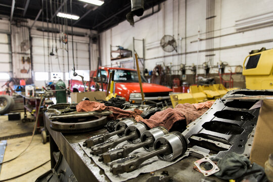 Piston on Workbench in Auto Repair Shop