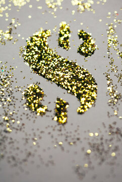 Stencil of a dollar sign in gold glitter - so blingy $
