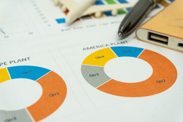 business report with pen statement with graph and data analysis