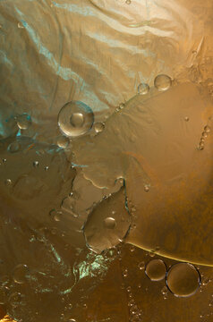 closeup macro globules droplets bubbles of oil and water intermixing