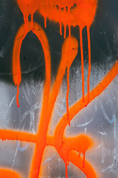 Brightly colored graffiti on building wall