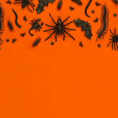 Obraz premium Black Halloween creepy crawly bugs and spiders on orange background with blank space for text