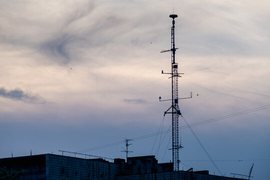 Wireless communication mobile cell network tower on a house