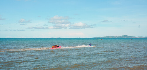 boat and jet ski popular activity on the beach in Thailand in the summer 