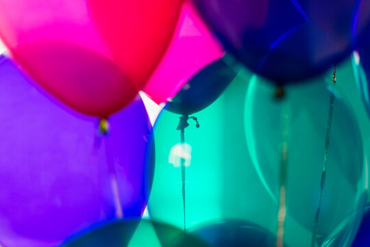 Close up of gold sequin string and balloons