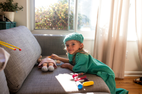 little girl dressed up as doctor