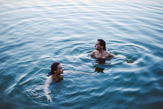 Friends are swimming