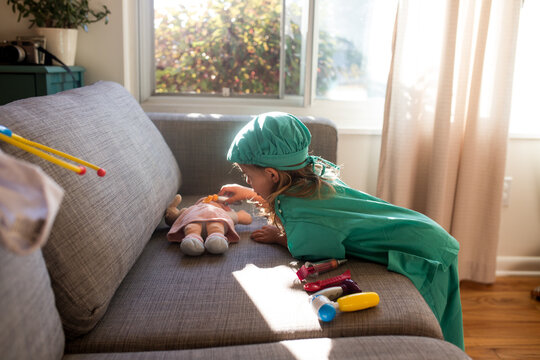 little girl dressed up as doctor