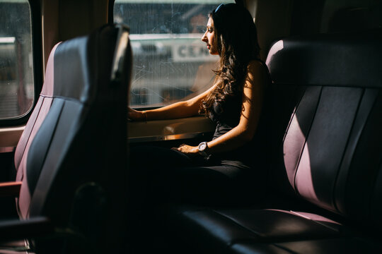 Woman on a train trip