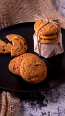 Shortbread cookies on a black plate,side view