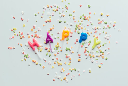 Word 'Happy' Written With Candle Letters