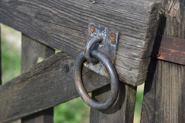 Wicket handle on a rustic fence