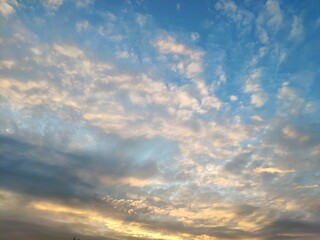 beautiful sky with clouds at sunset. Panoranic sunset sky with colorful clouds