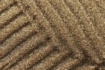   gold glitter texture.golden wave pattern.Golden glitter background.Festive New Year and Christmas shiny glitter layout.Vibrant background with twinkle lights. shiny gold