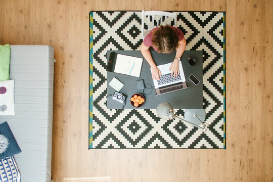 Woman Working On The Laptop At The Home Office