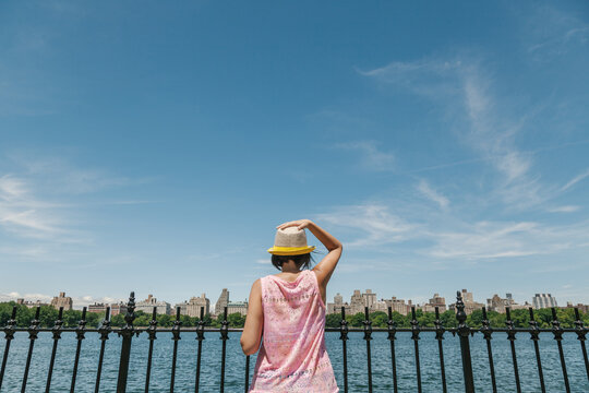 Woman Admiring the Views of the Jacqueline Kennedy Onassis Reservoir in Manhattan, New York